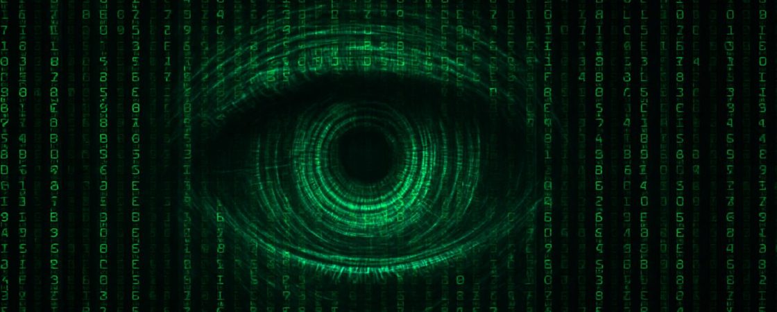Digitales Auge im Matrix-Stil vor grünem Code-Hintergrund – symbolisiert KI-Überwachung und Datenerfassung in einer vernetzten Welt
