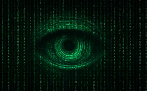 Digitales Auge im Matrix-Stil vor grünem Code-Hintergrund – symbolisiert KI-Überwachung und Datenerfassung in einer vernetzten Welt